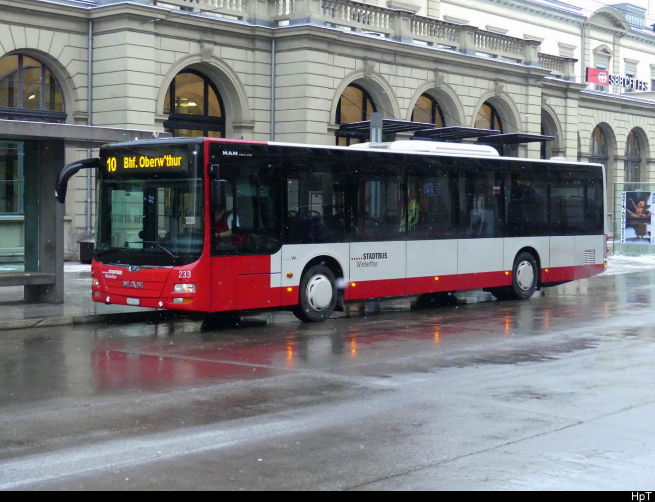 Stadtbus Winterthur - MAN Lion`s City  Nr.233  ZH 740233 unterwegs bei leichtem Schneefall in Winterthur am 2023.01.22