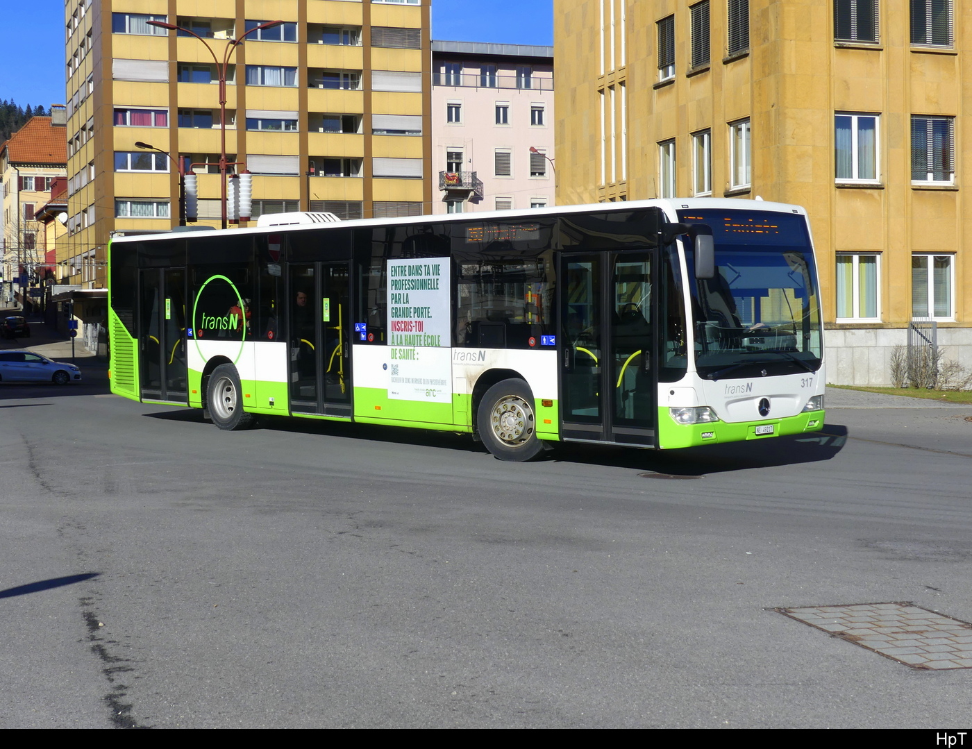 TransN - Mercedes Citaro Nr.317  NE 49217 unterwegs in der Stadt La Chaux de Fonds am 28.01.2024