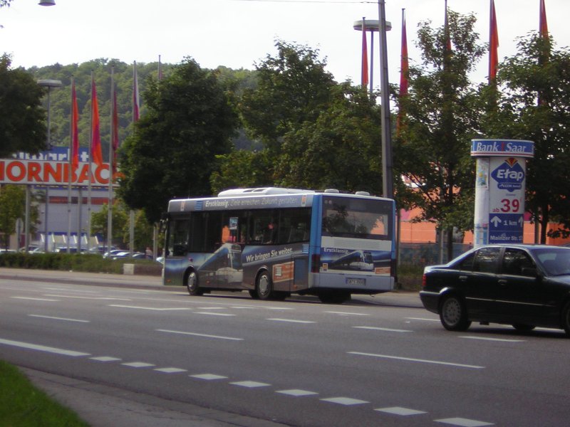 Ein MAN Bus auf dem Weg zur Haltestelle Rmerkastell. Besonders toll finde ich die Saarbahn Werbung auf dem Bus.