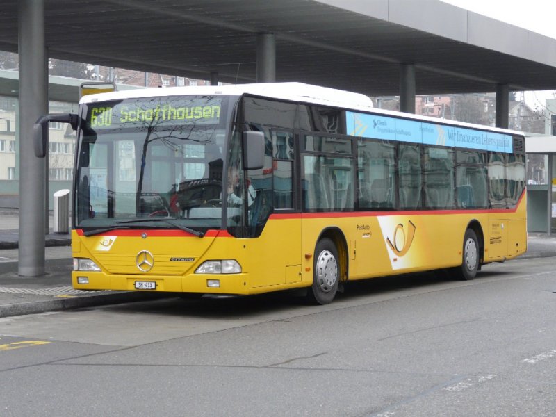 POST - Mercedes Citaro Postauto SH 413 bei der Bushaltestelle neben dem Bahnhof von Schaffhausen am 01.01.2008