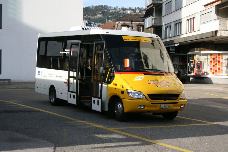 Regie Delemont, JU 31'046 (Sprinter-ähnliches Gefährt für den Stadtbus Delemont) am 9.10.2006 bei der Post Delemont. 
