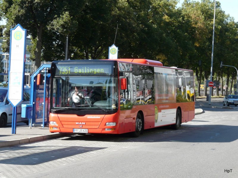 Südbadenbus - MAN Lion`s City  FR:JS 431 unterwegs auf der Linie 7351 bei den Haltestellen vor dem Bahnhof in Singen am 31.08.2009