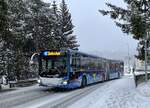 Engadin Bus, St.Moritz. MAN Lion’s City 18 Hybrid (GR 156’993) in Champfèr, Schulhaus. (29.12.2021)