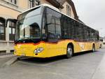 PostAuto MB C2 hybrid '11233' von Postauto am 16.3.21 auf dem Bahnhofplatz Delemont.