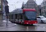 Stadtbus Winterthur - Hess Trolleybus Nr.132 unterwegs bei leichtem Schneefall in Winterthur am 2023.01.22