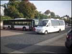 MAN Lion's City LE Ü aus Deutschland und Mercedes Sprinter von VBruns aus Deutschland im Stadthafen Sassnitz am 20.10.2012