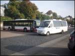 MAN Lion's City LE  aus Deutschland und Mercedes Sprinter von VBruns aus Deutschland im Stadthafen Sassnitz am 20.10.2012