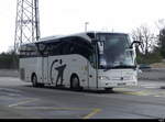 Reisebus - Mercedes Tourismo ED-923-WD bei der zufahrt zu den Bus Haltestellen vor dem Flughafen in Genf am 24.03.2024