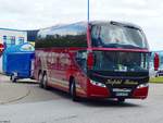 Neoplan Cityliner von Kofahl Reisen mit Anhänger aus Deutschland in Rostock am 27.06.2017