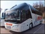 Neoplan Starliner von Rexer aus Deutrschland im Stadthafen Sassnitz am 28.03.2014