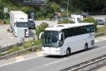 Même Noge Mercedes Touring de la maison italienne FM Coach di Maramigi photographié le 08.07.2012 entre Bâle et Berne