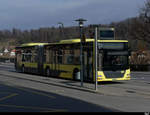 STI - MAN Lion`s City  Nr.142  BE  801142 bei den Bushaltestellen vor dem Bahnhof in Spiez am 28.02.2021