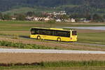 Zwischen den Feldern von Absam unterwegs ist dieser MAN Lion's City von Innbus Regionalverkehr/Innsbrucker Verkehrsbetriebe.