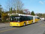 Postauto - Mercedes O 405 GN ZH 780687 beim Bahnhof in Bülach am 01.04.2011  