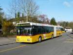 Postauto - Mercedes O 405 GN ZH 780687 beim Bahnhof in Blach am 01.04.2011
