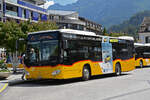 Mercedes Citaro der Post, auf der Linie 104, wartet am 03.07.2023 beim Bahnhof Interlaken West.