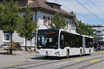 Mercedes Citaro 711 von Intertours, auf der Tramersatzlinie 11, f�hrt am 06.07.2026 durch die Hauptstrasse in Reinach zur Haltestelle Reinach Dorf.