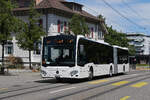 Mercedes Citaro 713 von Intertours, auf der Tramersatzlinie 11, f�hrt am 06.07.2026 durch die Hauptstrasse in Reinach zur Haltestelle Reinach Dorf.