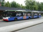 03.06.09,NEOPLAN der BOGESTRA Nr.0164 in Wanne Eickel mit Werbung fr Fahrzeugbegleiter.