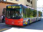 ENGADIN - Neoplan Gelenkbus  GR 156991 mit Teilwerbung unterwegs auf der Linie 2 Maloia bei der Bushaltestelle vor dem bahnhof von Samedan am 25.08.2007