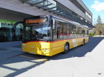 Postauto - Solaris  GR  95517 bei den Postautohaltestellen vor dem Bahnhof in Landquart am 26.03.2016