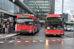 Bernmobil Nrn. 284/BE 419'284 und 121/BE 624'121 Volvo am 2. September 2009 beim Bahnhof.