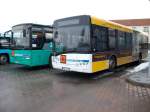 Ein VOLVO links und ein SOLARIS am 10.Januar 2011 am Busbahnhof in Bergen/Rügen.