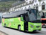 VDL Futura Flixbus betrieben durch Mikanovic am 18.5.19 auf dem Bahnhofplatz Brig.
