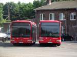 Zwei Mercedes Benz Citaro Ü der RKH am 05.07.13 in Hanau durch den Zaun fotografiert