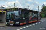 Ein Niederflurbus mit Kstritzer-Werbung steht am 29.08.09 vor dem  Empfangsgebude  in Maschen und wird bald seine Reise als Bus 343 nach Fleestedt antreten.