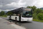 MAN Lion's City von Postbus (BD-15108) als Linie 4012 in Anfahrt auf die Haltestelle St. Johann i.T. Schülerperron. Aufgenommen 13.6.2022.