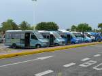 22.09.09,der erste Bus ist ein Iveco am Aeropuerto Internacional de Codolar auf Ibiza.