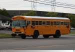 Blue Bird All American FE Schulbus der  Rush-Henrietta Central Schools . Aufgenommen in Henrietta, New York / USA am 9. September 2013.