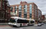 Halifax Transit (Stadtbus): Ein Gelenkbus des Herstellers Nova Bus, Wagennummer 719, aufgenommen im September 2014 in der Innenstadt (Barrington Street) von Halifax (Nova Scotia, Kanada).