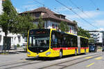 Mercedes Citaro 94 der BLT, auf der Tramersatzlinie 11, f�hrt am 06.07.2026 durch die Hauptstrasse in Reinach zur Haltestelle Reinach Dorf.
