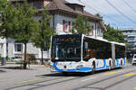 Mercedes Citaro 214 von Busbetrieb Olten G�sgen, auf der Tramersatzlinie 11, f�hrt am 06.07.2026 durch die Hauptsrasse in Reinach zur Haltestelle Reinach Dorf.