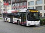 Postauto - MAN Lion`s City AG 266593 unterwegs auf der Linie 371 bei den Bushaltestellen vor dem Bahnhof Brugg am 24.10.2013