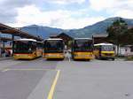 Postauto - Kleine Postauto Parade in Gstaad bei den Bushaltestellen auf dem Bahnhofsplatz am 27.07.2014