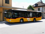 Postauto - Mercedes Citaro  JU  26790 bei den Bushaltestellen beim Bahnhof in Delemont am 09.07.2016