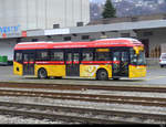 Postauto - Volvo 7900 Hybrid  TI 264793 in Giubiasco beim Bahnhof am 12.02.2021