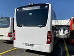 Heckansicht des neuen MB C2 G Ü hybrid '11740' für PostAuto Regie Delemont am 24.9.21 bei Interbus Kerzers.