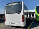 Heckansicht des neuen MB C2 G Ü '11738' für PostAuto Regie Delemont am 1.10.21 bei Interbus Kerzers.