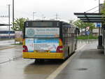 Postauto - MAN Lions City (SZ 120 605) steht am Bahnhof Siebnen-Wangen am 1.5.23