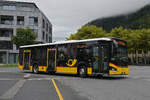 MAN Lions City Hybridbus der Post, auf der Linie 103, fährt am 28.08.2025 zur Haltestelle beim Bahnhof Interlaken Ost.