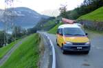 Das kleinste PostAuto der Zentralschweiz: Wagen SZ 714 von PU Gisler aus Riemenstalden, ein Toyota Hiace aus 2000, fährt zwei mal Täglich den Kurs von Riemendtalden zum SBB-Bahnhof Sisikon.