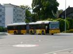 Postauto -  MAN  BE 354980 in Lyss am 13.07.2013