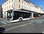 tpg - MAN Lion`s City Hybrid Nr.2073 unterwegs in der Stadt Genf am 2023.01.01