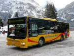 Grindelwald Bus - MAN Lion`s City  BE 364408 bei den Bushaltestellen beim Bahnhof Grindelwald am 25.02.2011