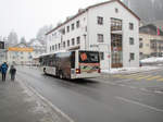 Postauto - MAN Lions City (GR 82488) unterwegs als Sportbus im Zentrum von Lenzerheide am 19.2.20
