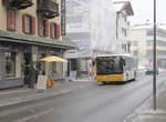 Postauto - MAN Lions City (GR 82488) unterwegs als Sportbus im Zentrum von Lenzerheide am 19.2.20